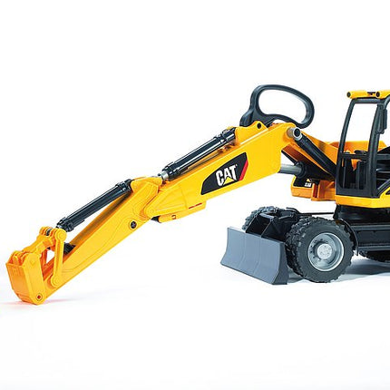 Pelle excavatrice sur pneus cat - bruder 02446