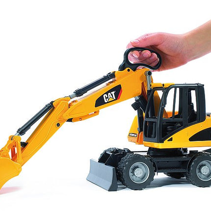 Pelle excavatrice sur pneus cat - bruder 02446