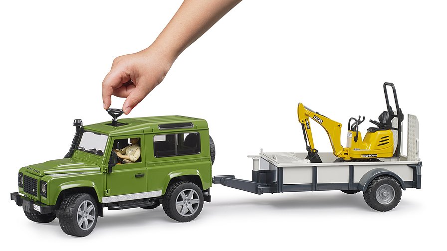 Land rover defender avec remorque, cat et figurine - bruder 02593